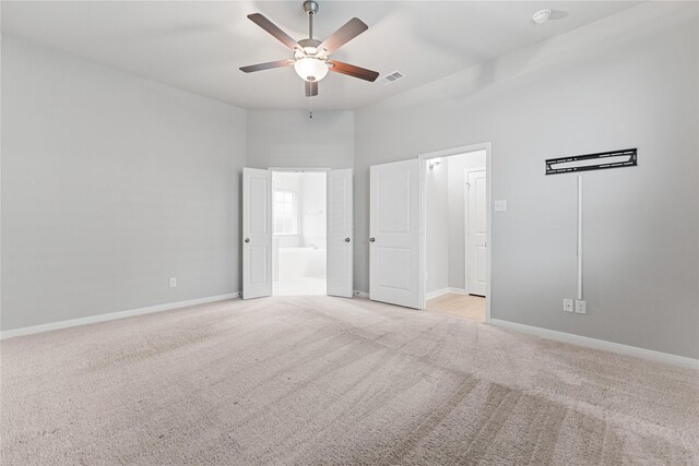 3625 Beutel Rd, Waco, TX 76655 - unfurnished bedroom featuring light carpet, baseboards, ensuite bath, and ceiling fan