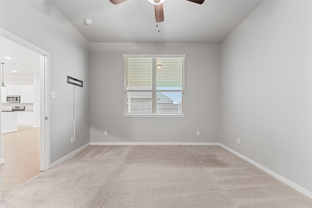 3625 Beutel Rd, Waco, TX 76655 - spare room featuring a ceiling fan, baseboards, and light colored carpet