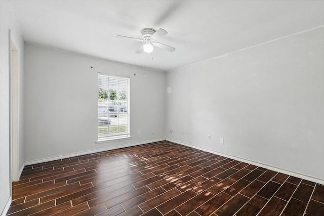 6529 Wooddale Dr, Watauga, TX 76148 - empty room featuring ceiling fan, wood finished floors, and baseboards