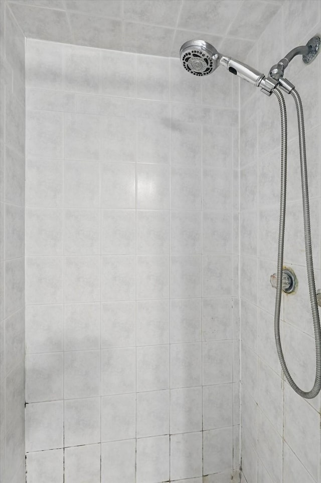 6529 Wooddale Dr, Watauga, TX 76148 - bathroom featuring tiled shower