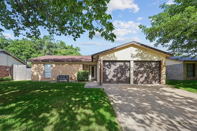 6529 Wooddale Dr, Watauga, TX 76148 - ranch-style house featuring a garage, brick siding, and driveway