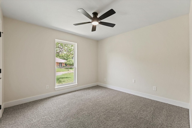 6210 Maple Springs Dr, Arlington, TX 76001 - empty room with carpet, a ceiling fan, and baseboards