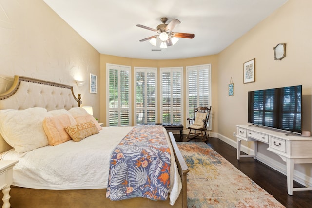 701 Mason Dr, Allen, TX 75013 - bedroom featuring dark wood-type flooring, baseboards, and ceiling fan