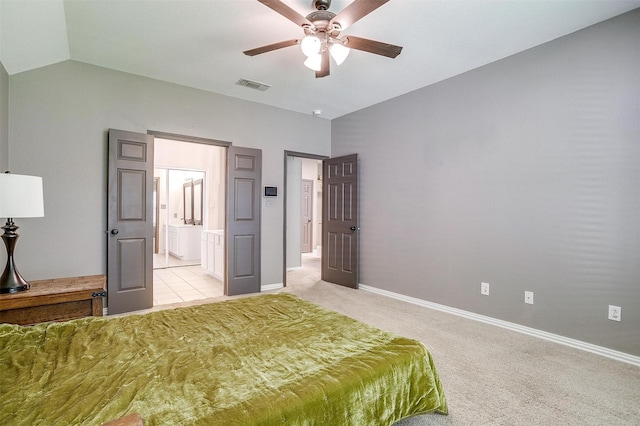 1100 Highcrest Dr, Burleson, TX 76028 - bedroom featuring baseboards, light carpet, lofted ceiling, connected bathroom, and ceiling fan