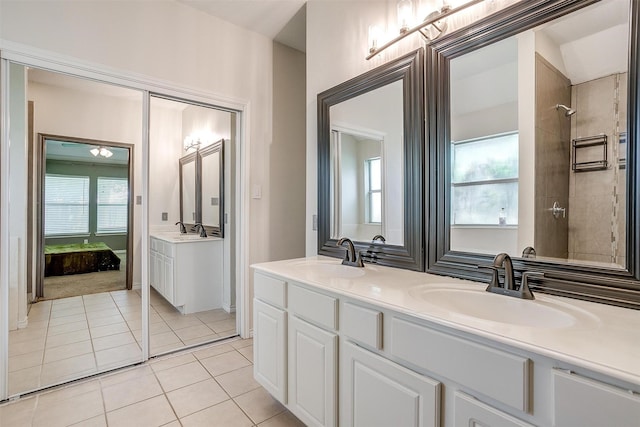 1100 Highcrest Dr, Burleson, TX 76028 - bathroom with tile patterned floors, double vanity, and healthy amount of natural light