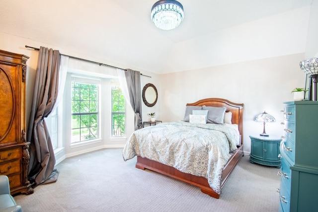 8200 Edgewater Dr, Frisco, TX 75034 - bedroom with carpet floors, vaulted ceiling, and baseboards