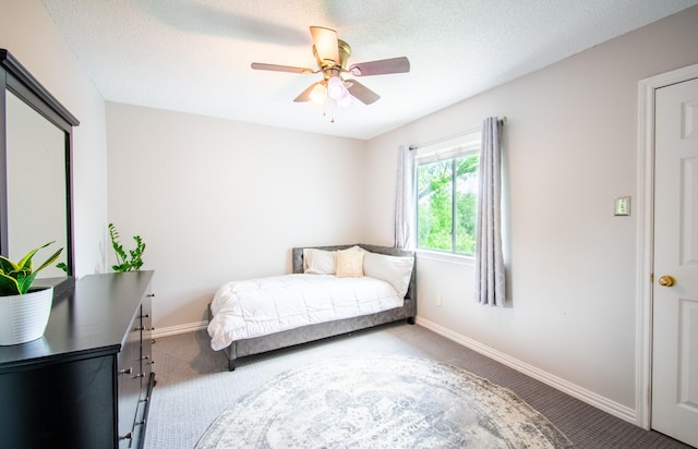 8200 Edgewater Dr, Frisco, TX 75034 - bedroom with carpet flooring, baseboards, and ceiling fan