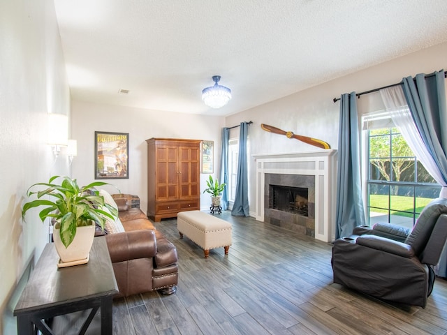 8200 Edgewater Dr, Frisco, TX 75034 - living area with wood finished floors and a fireplace