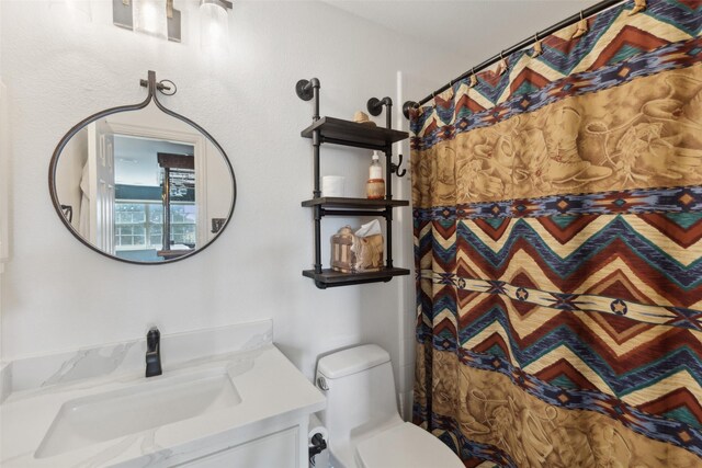 731 Bradford St, Lantana, TX 76226 - full bathroom with toilet, vanity, and curtained shower
