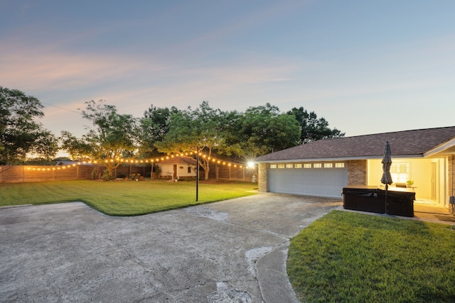 731 N Horne St, Duncanville, TX 75116 - ranch-style home featuring driveway, a hot tub, and an attached garage