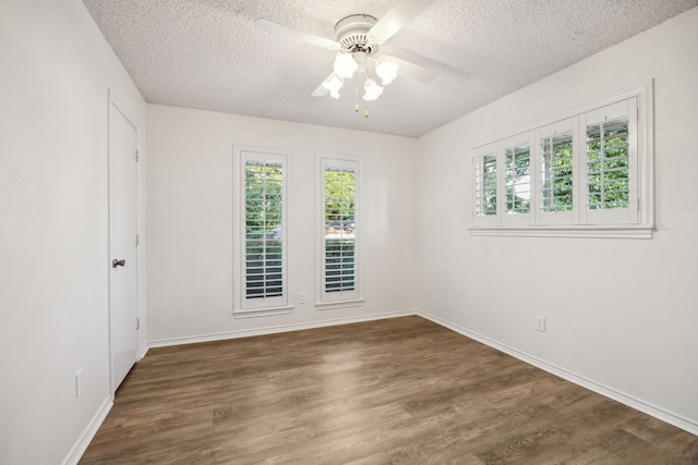 731 N Horne St, Duncanville, TX 75116 - spare room featuring a textured ceiling, plenty of natural light, ceiling fan, and wood finished floors