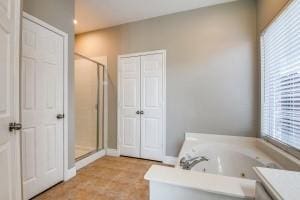 2789 Coyote Trl, Little Elm, TX 75068 - full bath featuring a stall shower, a garden tub, and vanity