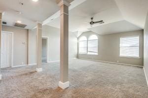 2789 Coyote Trl, Little Elm, TX 75068 - unfurnished room featuring carpet floors, vaulted ceiling, decorative columns, and baseboards