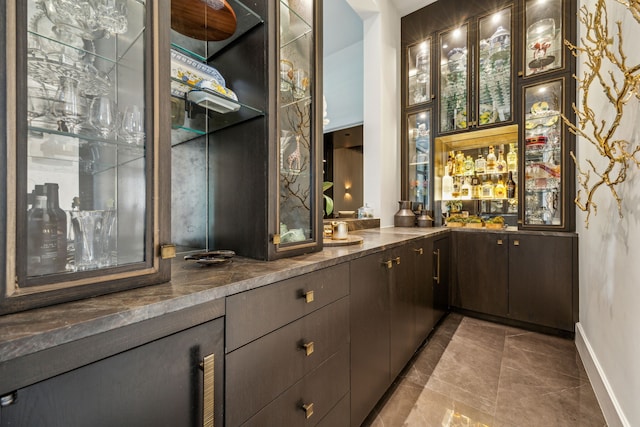 5214 Royal Ln, Dallas, TX 75229 - bar featuring baseboards