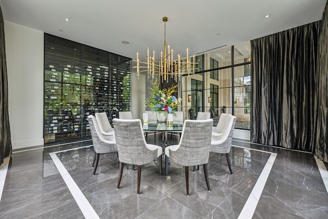 5214 Royal Ln, Dallas, TX 75229 - dining area with marble tiled floors, a chandelier, a towering ceiling, and recessed lighting
