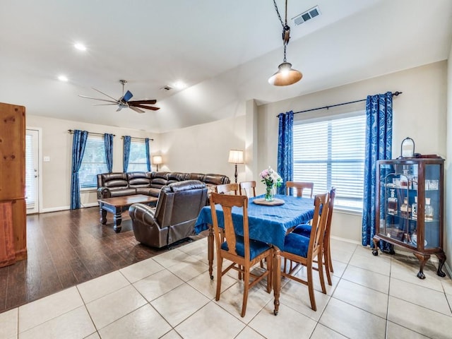 1209 Golden Eagle Ct, Aubrey, TX 76227 - dining area with vaulted ceiling, healthy amount of natural light, ceiling fan, baseboards, and light tile patterned floors