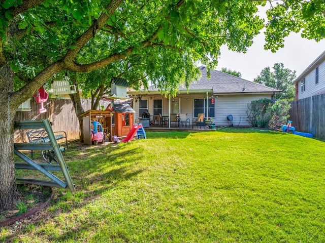 1209 Golden Eagle Ct, Aubrey, TX 76227 - rear view of property featuring a patio area