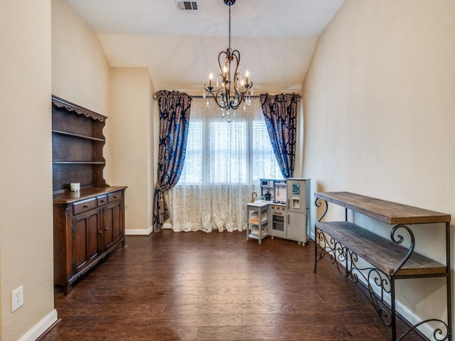 1209 Golden Eagle Ct, Aubrey, TX 76227 - sitting room featuring a chandelier, dark wood-style flooring, vaulted ceiling, and baseboards