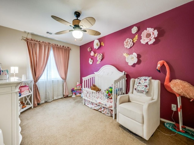 1209 Golden Eagle Ct, Aubrey, TX 76227 - carpeted bedroom featuring a nursery area and ceiling fan