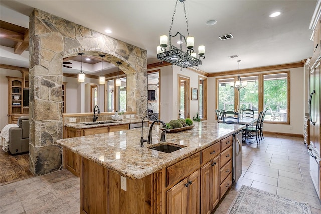 4312 Tapatio Springs Rd, Fort Worth, TX 76108 - kitchen with a sink, brown cabinetry, a center island with sink, crown molding, and recessed lighting