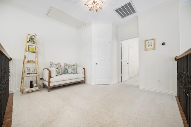6137 Oram St, Dallas, TX 75214 - sitting room with attic access, crown molding, baseboards, and carpet