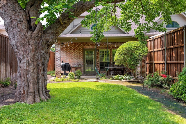 6137 Oram St, Dallas, TX 75214 - back of house with brick siding and a shingled roof