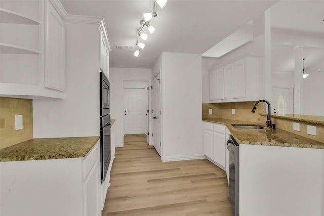 289 Cates Rd, Van Alstyne, TX 75495 - kitchen featuring appliances with stainless steel finishes, light stone counters, white cabinets, and tasteful backsplash
