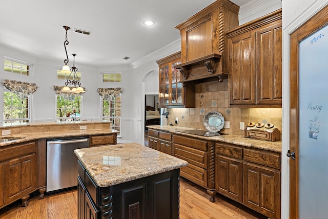 148 Arista Trl, Poolville, TX 76487 - kitchen featuring stainless steel dishwasher, arched walkways, a center island, backsplash, and black electric stovetop