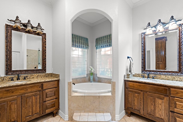 148 Arista Trl, Poolville, TX 76487 - bathroom featuring tile patterned floors, ornamental molding, a garden tub, and two vanities