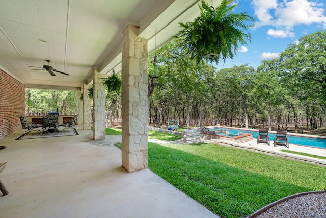 148 Arista Trl, Poolville, TX 76487 - view of patio / terrace with a ceiling fan, outdoor dining area, and an outdoor pool