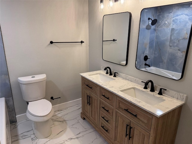 1220 Brittany Ln, Arlington, TX 76013 - bathroom with baseboards, marble look tiles, toilet, and double vanity