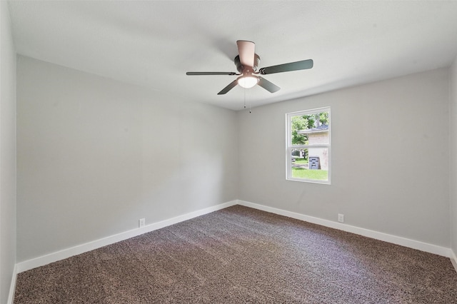 1220 Brittany Ln, Arlington, TX 76013 - empty room with dark colored carpet, baseboards, and ceiling fan