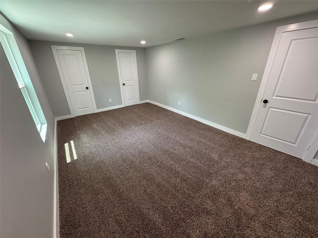1220 Brittany Ln, Arlington, TX 76013 - unfurnished bedroom featuring recessed lighting, dark carpet, and baseboards