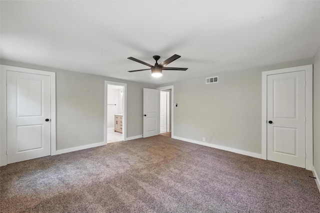 1220 Brittany Ln, Arlington, TX 76013 - unfurnished bedroom with carpet flooring, baseboards, connected bathroom, and a ceiling fan