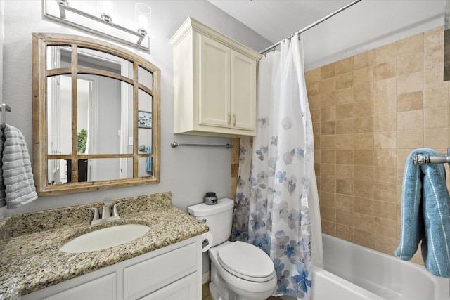 227 Justin Rd, Murphy, TX 75094 - bathroom featuring toilet, vanity, and shower / bath combo with shower curtain