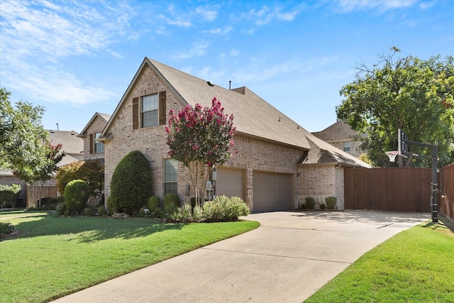 227 Justin Rd, Murphy, TX 75094 - view of front of property featuring brick siding, driveway, a shingled roof, and a garage