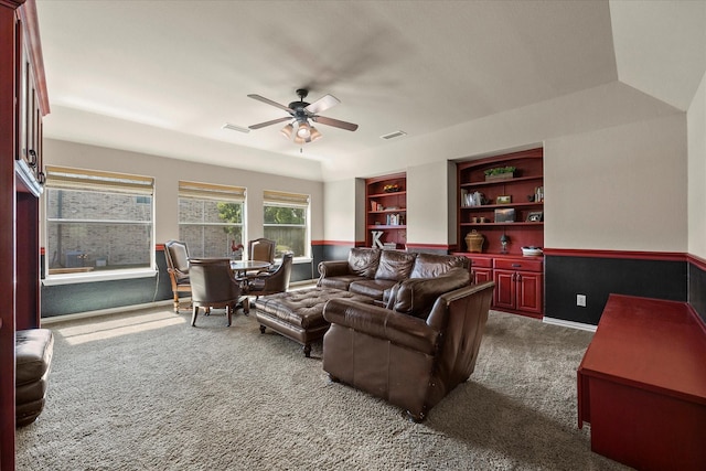 227 Justin Rd, Murphy, TX 75094 - living room featuring carpet, a ceiling fan, built in shelves, and baseboards