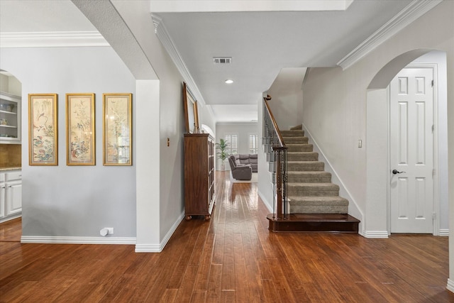 227 Justin Rd, Murphy, TX 75094 - entryway with dark wood-style flooring, stairway, baseboards, arched walkways, and recessed lighting