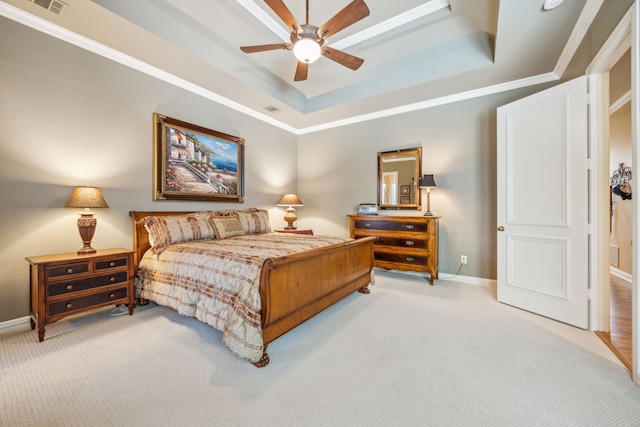 4024 Oakmeadow Dr, Plano, TX 75093 - carpeted bedroom featuring a raised ceiling, baseboards, crown molding, and a ceiling fan