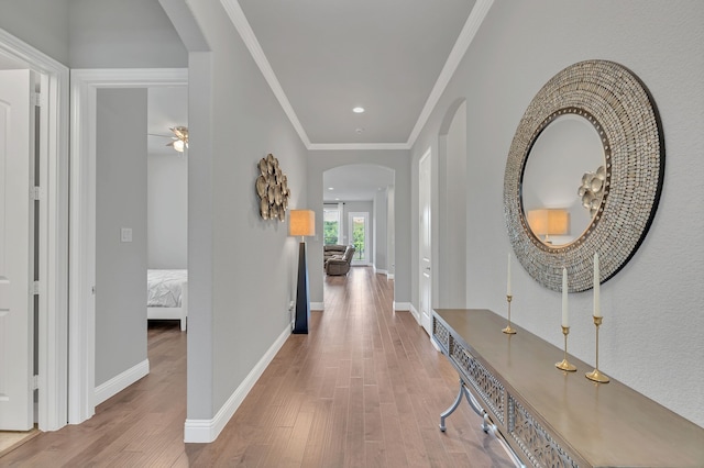 14937 Belclaire Ave, Aledo, TX 76008 - hall featuring arched walkways, wood finished floors, crown molding, baseboards, and recessed lighting