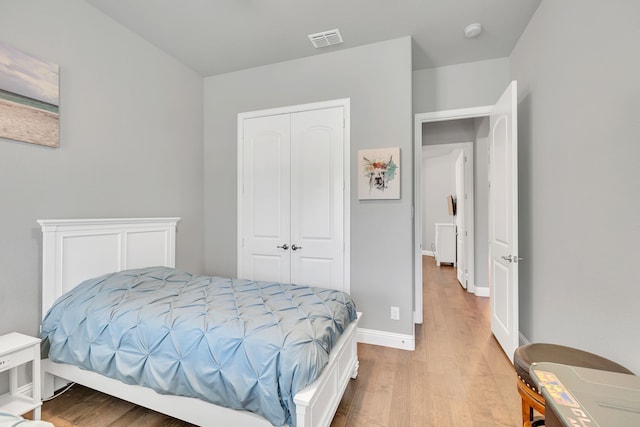 14937 Belclaire Ave, Aledo, TX 76008 - bedroom featuring wood finished floors, a closet, baseboards, and radiator