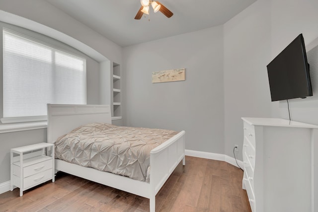 14937 Belclaire Ave, Aledo, TX 76008 - bedroom with wood finished floors, baseboards, and a ceiling fan
