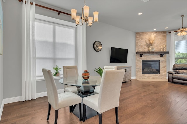 14937 Belclaire Ave, Aledo, TX 76008 - dining area with wood finished floors, a stone fireplace, baseboards, recessed lighting, and a chandelier
