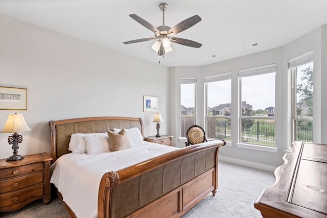 762 Corner Post Path, Celina, TX 75009 - bedroom featuring light colored carpet, multiple windows, baseboards, and a ceiling fan