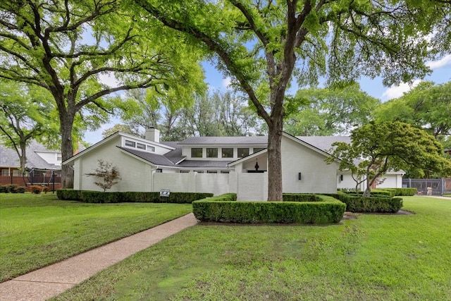 mid-century inspired home with a chimney