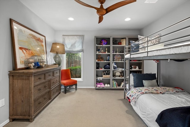 carpeted bedroom featuring baseboards, recessed lighting, and ceiling fan