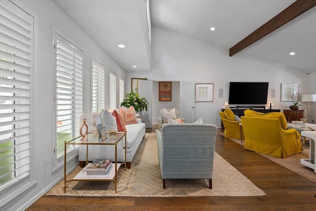 living room featuring dark wood-style floors, plenty of natural light, and recessed lighting
