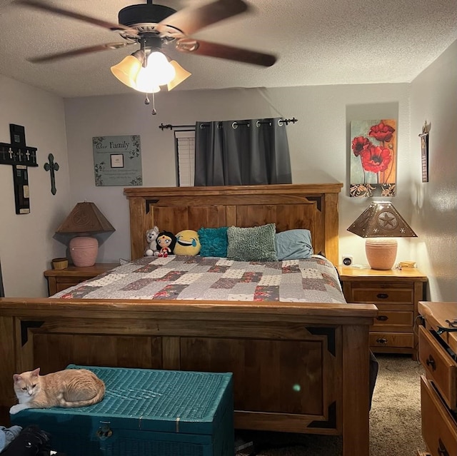 904 Church St, Winnsboro, TX 75494 - bedroom featuring light carpet, a textured ceiling, and a ceiling fan