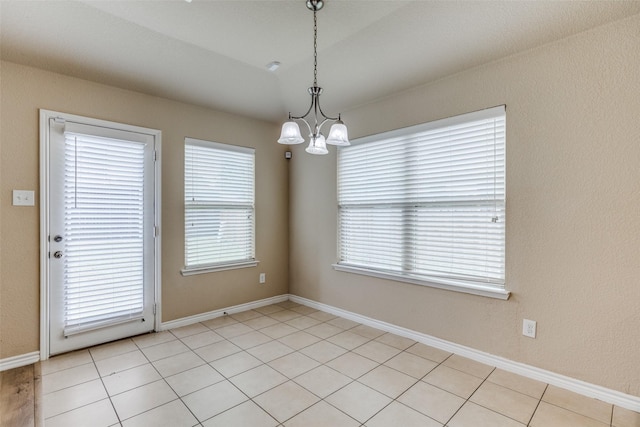 5844 Sunny Meadow Ln, Grand Prairie, TX 75052 - spare room with a chandelier and baseboards