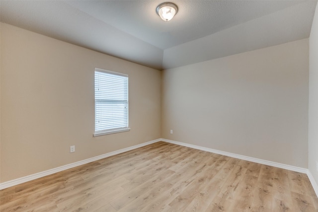 5844 Sunny Meadow Ln, Grand Prairie, TX 75052 - spare room with light wood-style flooring and baseboards